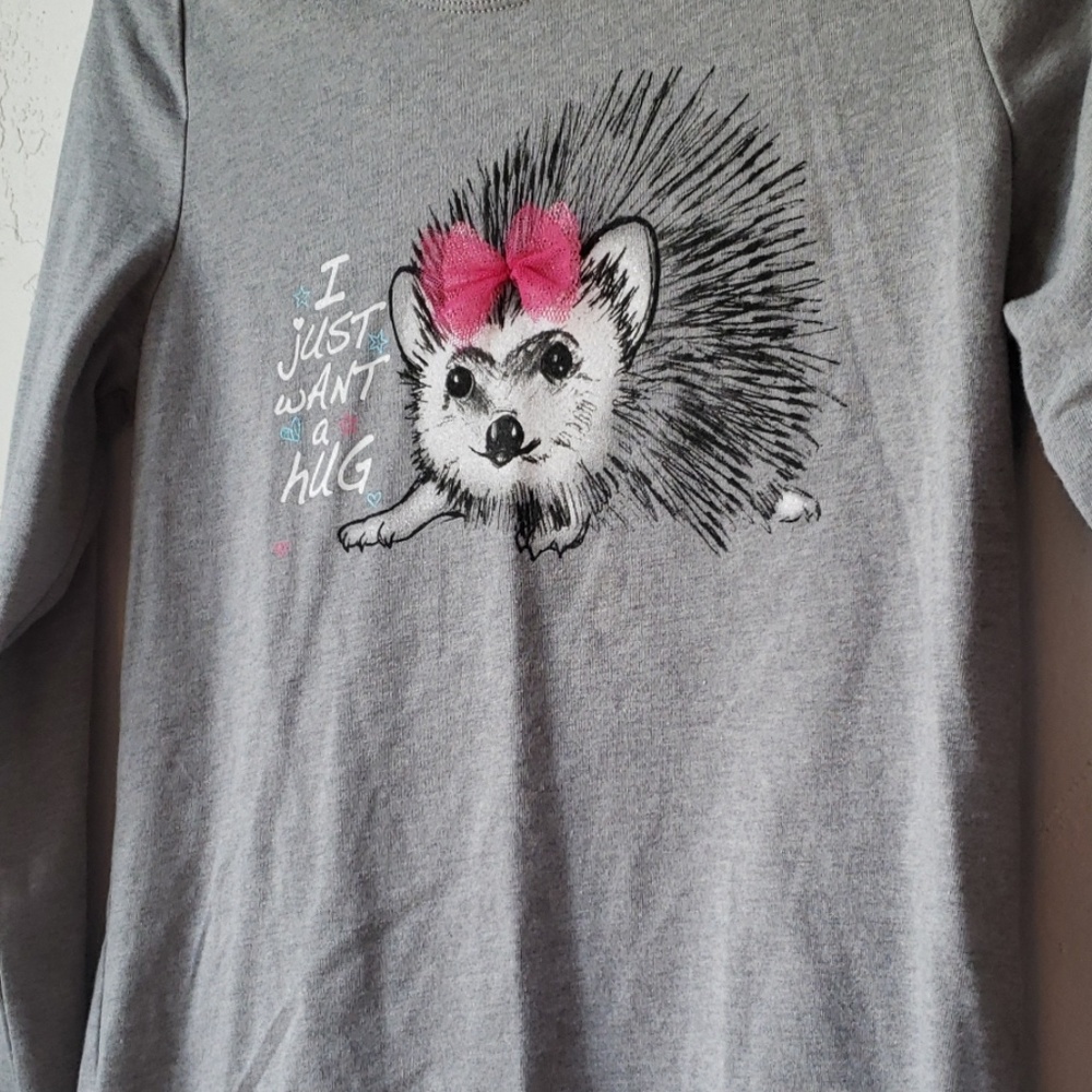 Adorable hedgehog shirt.